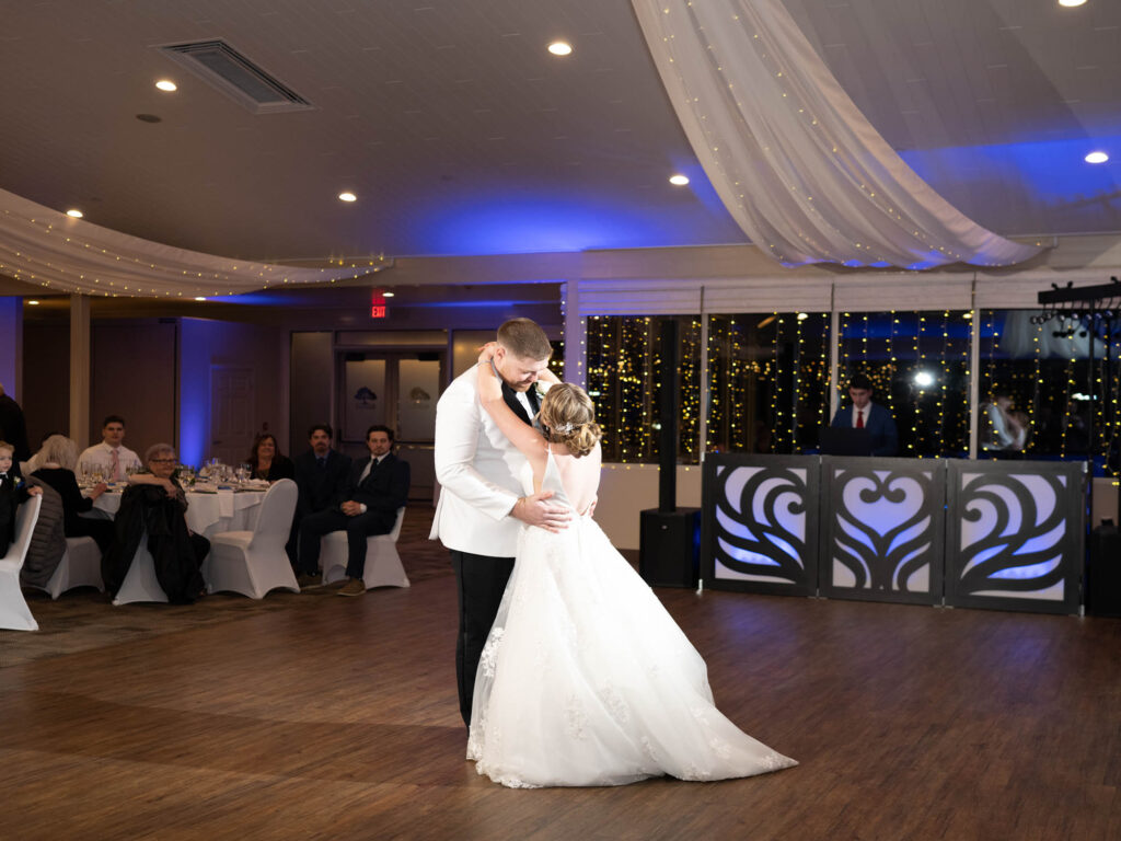 Blue uplighting for first dance at woodstone country club & lodge