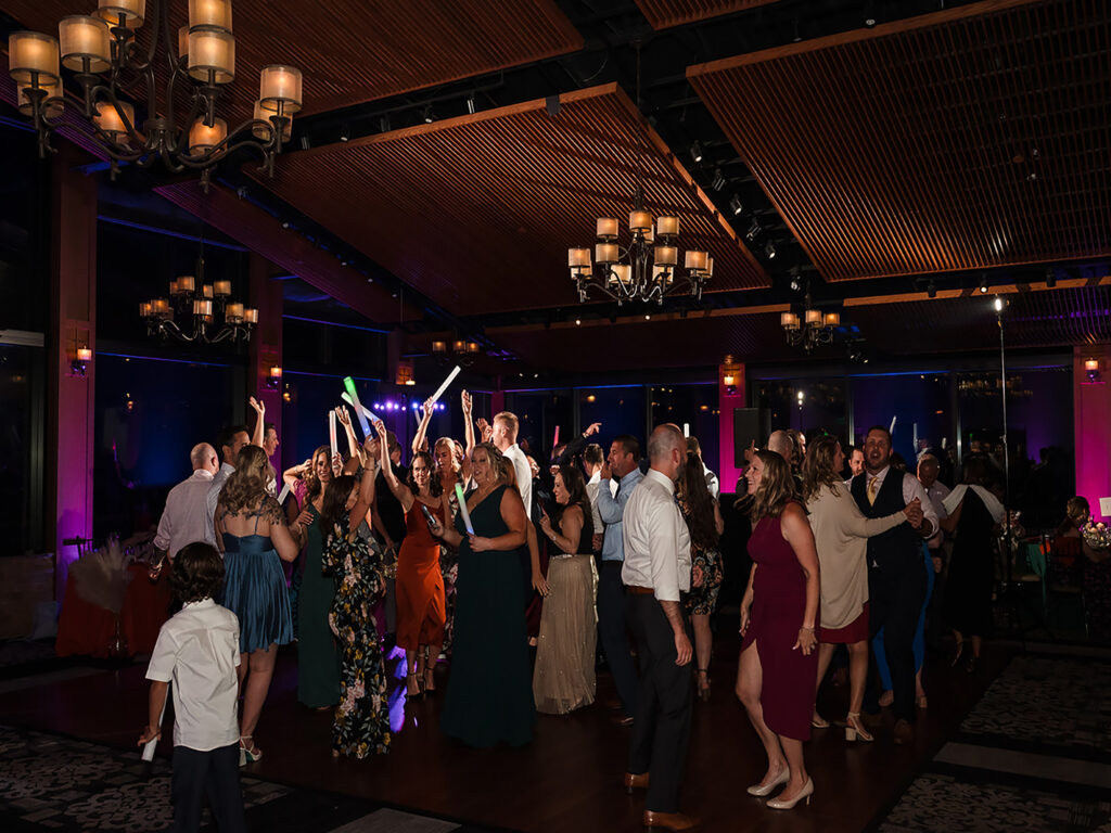 Purple uplighting on wedding dancefloor at blue mountain resort