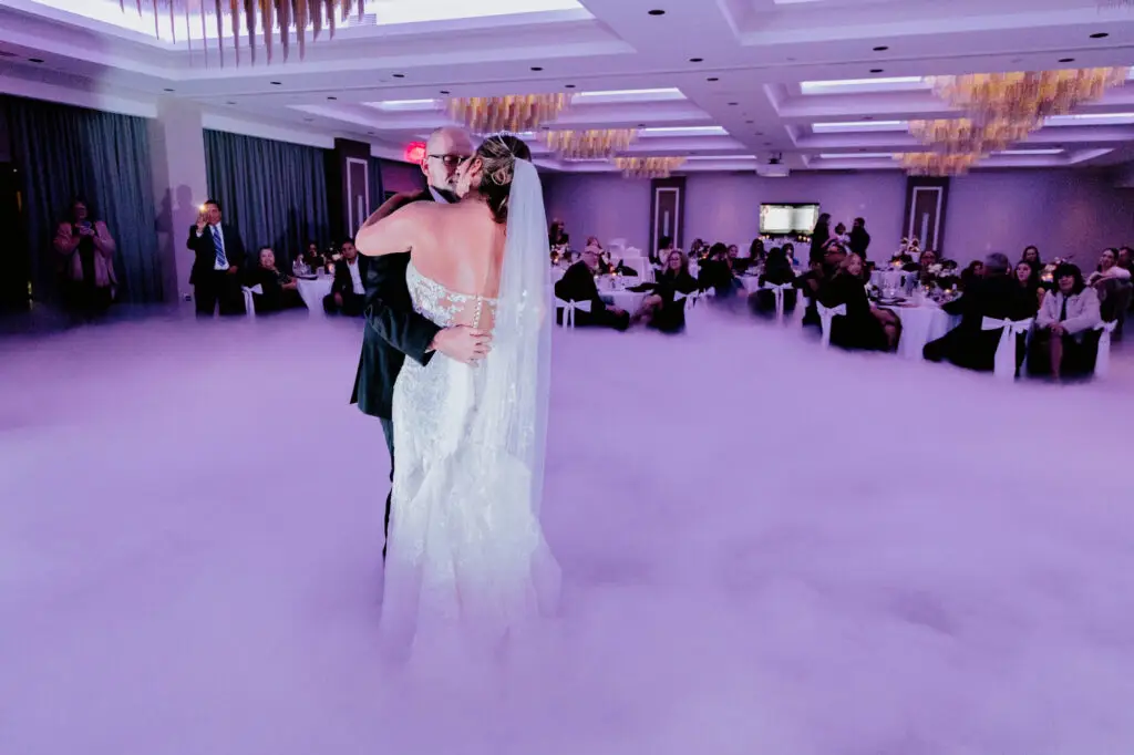 Bride and groom first dance dancing on the clouds