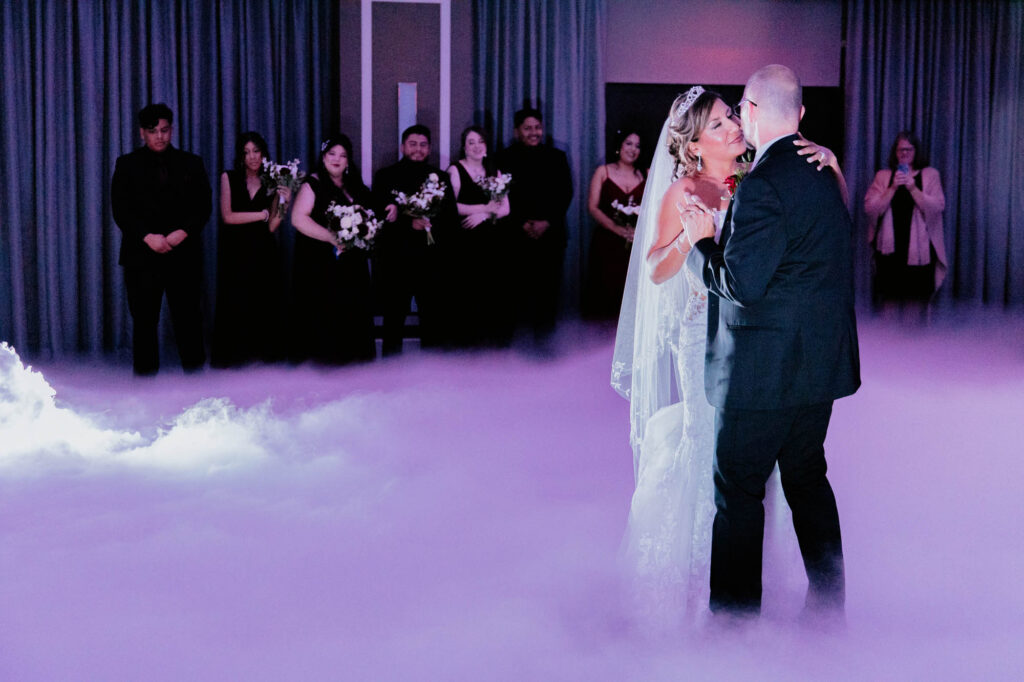 Bride and groom first dance dancing on the clouds
