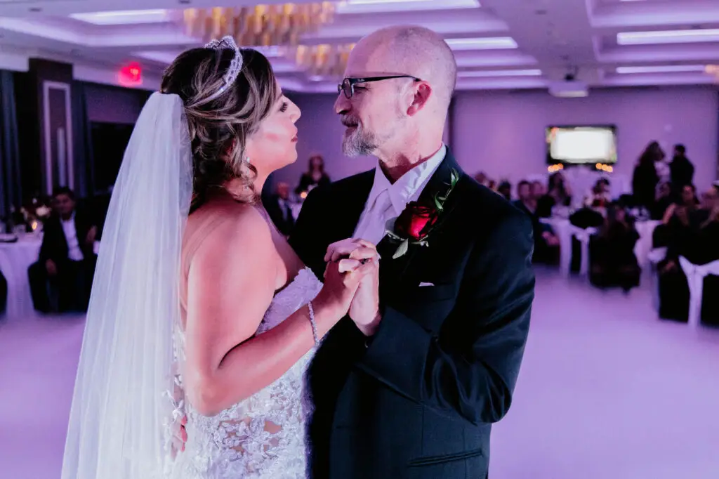 Bride and groom first dance dancing on the clouds